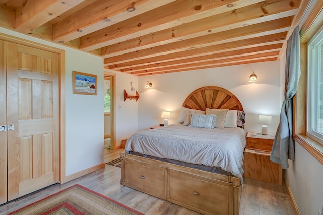 33 Karwendal Strasse, Bartlett, NH 03812 - bedroom with beamed ceiling, light wood-style flooring, and baseboards