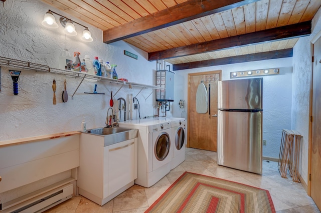 33 Karwendal Strasse, Bartlett, NH 03812 - laundry room with gas water heater, a textured wall, a baseboard radiator, wood ceiling, and washer and clothes dryer