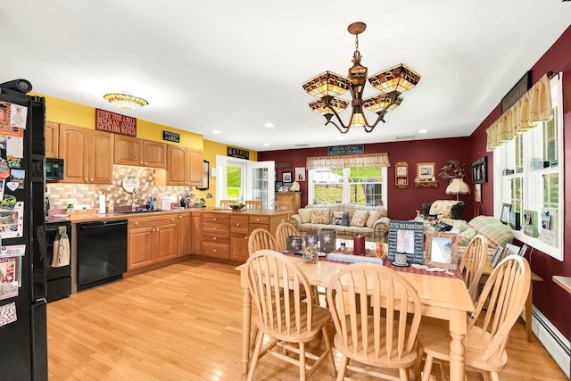 4 Mones Folly Dr, Dover, NH 03820 - dining area featuring a baseboard heating unit, light wood finished floors, recessed lighting, and a chandelier