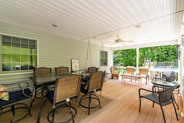 4 Mones Folly Dr, Dover, NH 03820 - wooden terrace featuring a ceiling fan, an outdoor pool, and outdoor dining space