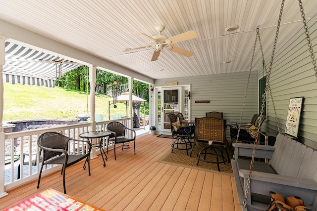 4 Mones Folly Dr, Dover, NH 03820 - wooden terrace with a ceiling fan and outdoor dining area