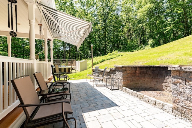 4 Mones Folly Dr, Dover, NH 03820 - view of patio with view of wooded area