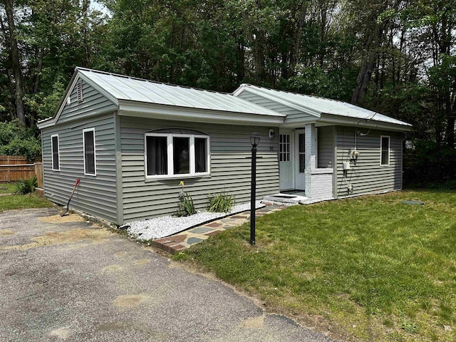 30 Flat Rock Bridge Rd, Rochester, NH 03868 - view of front of home featuring metal roof