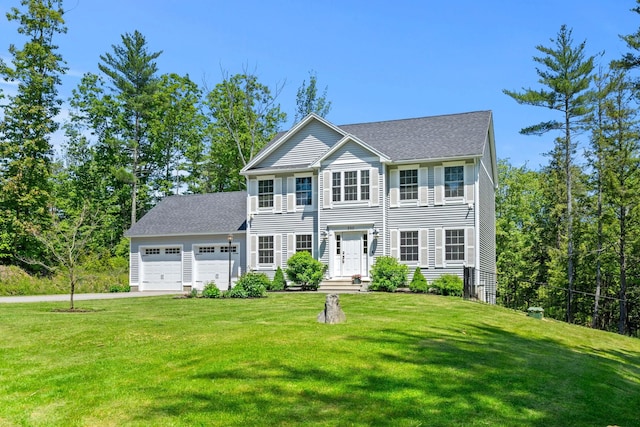 250 Harmony Rd, Northwood, NH 03261 - colonial inspired home with a garage, driveway, a front lawn, and roof with shingles