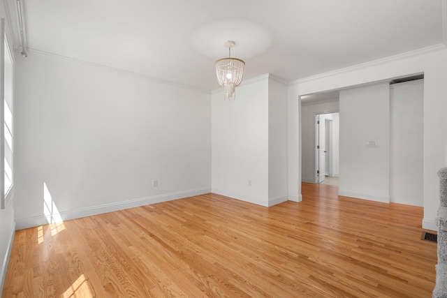 250 Harmony Rd, Northwood, NH 03261 - empty room featuring ornamental molding, light wood-style floors, a chandelier, and baseboards