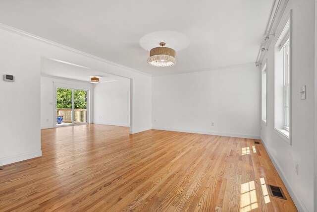 250 Harmony Rd, Northwood, NH 03261 - spare room with light wood-style flooring, ornamental molding, and baseboards