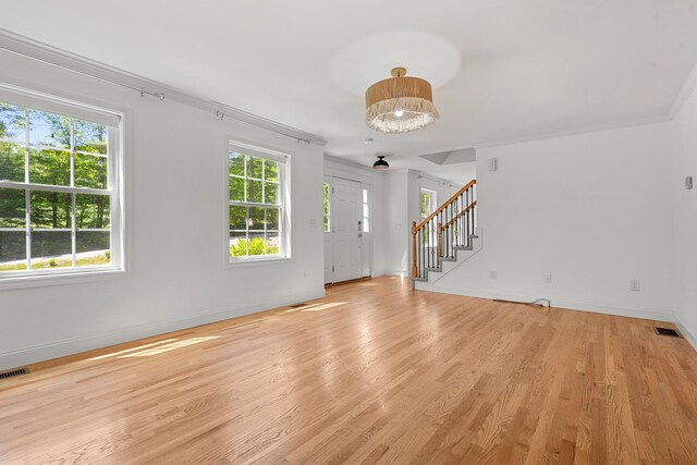 250 Harmony Rd, Northwood, NH 03261 - foyer featuring plenty of natural light, light wood-style floors, and crown molding