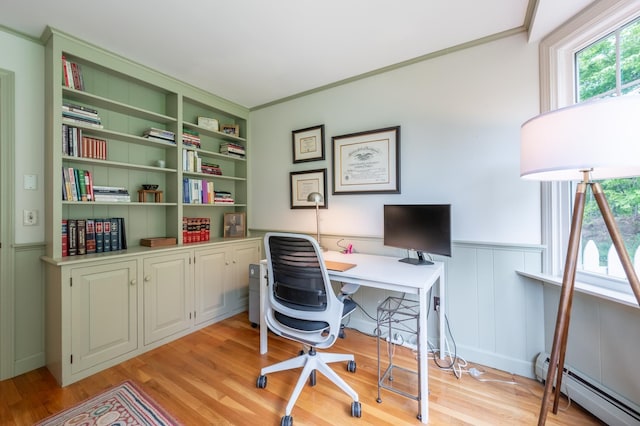 51 Carter Rd, New London, NH 03257 - home office with a baseboard heating unit, light wood finished floors, wainscoting, and a decorative wall