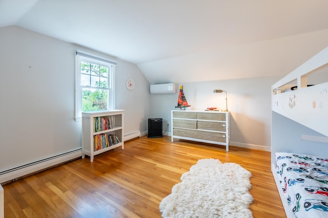 51 Carter Rd, New London, NH 03257 - bedroom with a wall unit AC, lofted ceiling, baseboard heating, and wood finished floors