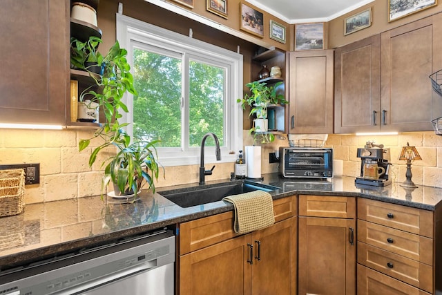 228 Platts Ave, Manchester, NH 03109 - kitchen featuring open shelves, stainless steel dishwasher, a sink, decorative backsplash, and dark stone countertops
