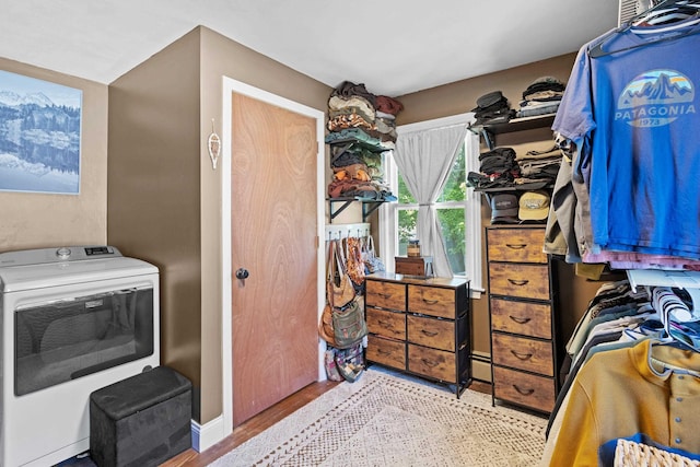228 Platts Ave, Manchester, NH 03109 - walk in closet with washer / dryer and light wood finished floors