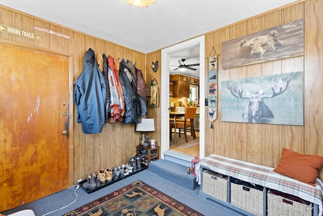 228 Platts Ave, Manchester, NH 03109 - mudroom featuring wooden walls, carpet flooring, and ceiling fan