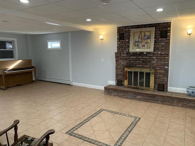 424 Main Dunstable Rd, Nashua, NH 03062 - unfurnished living room featuring a baseboard radiator, baseboards, a paneled ceiling, a fireplace, and recessed lighting