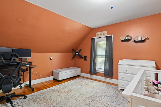 2124 Wakefield Rd, Wakefield, NH 03872 - bedroom with wood finished floors, lofted ceiling, and baseboards