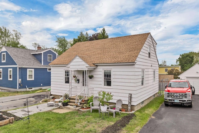 146 Anthony St, Manchester, NH 03103 - view of front facade with a shingled roof