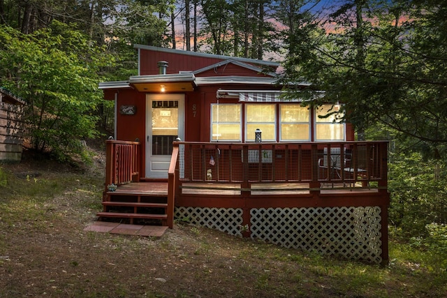 87 Lower Camp Rd, Northwood, NH 03261 - rear view of house with a wooden deck
