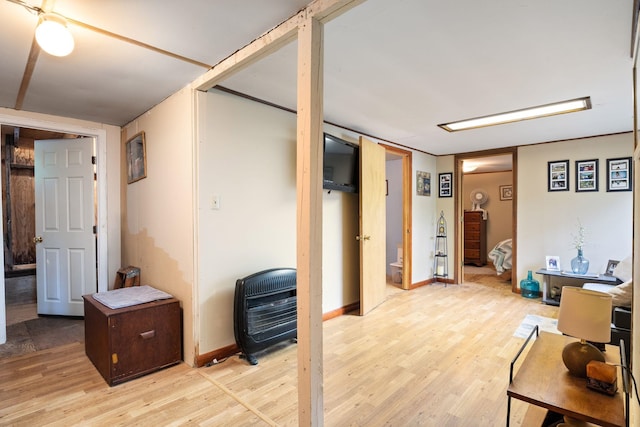 87 Lower Camp Rd, Northwood, NH 03261 - finished below grade area featuring light wood-style floors, heating unit, and baseboards