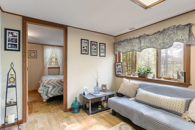 87 Lower Camp Rd, Northwood, NH 03261 - living area with light wood-style flooring, ornamental molding, and baseboards