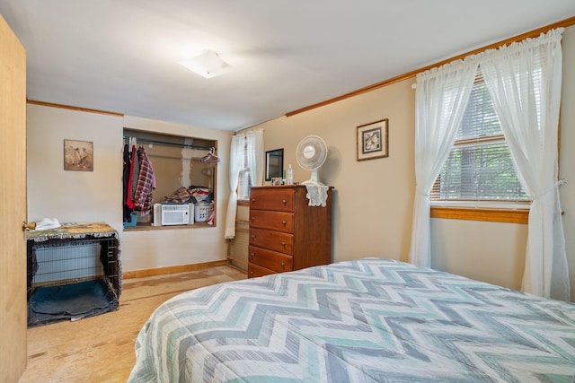87 Lower Camp Rd, Northwood, NH 03261 - bedroom with ornamental molding, wood finished floors, cooling unit, and baseboards