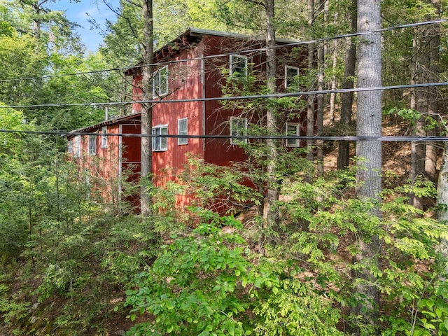 87 Lower Camp Rd, Northwood, NH 03261 - view of outbuilding with a view of trees