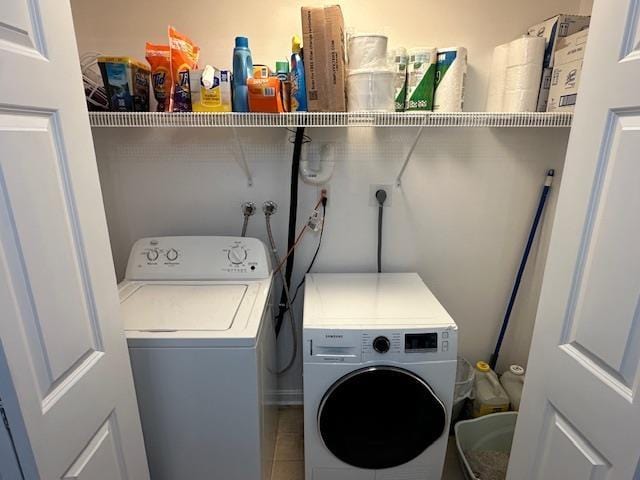 106 Betts Rd, Rochester, NH 03867 - laundry area featuring washer and clothes dryer and tile patterned flooring