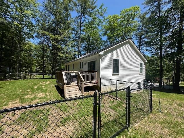 106 Betts Rd, Rochester, NH 03867 - view of property exterior featuring a gate and a deck
