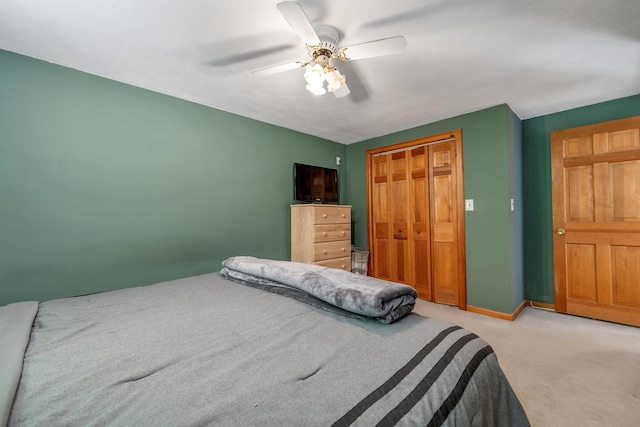 222 Main St, Alton, NH 03809 - bedroom featuring light carpet, a closet, ceiling fan, and baseboards