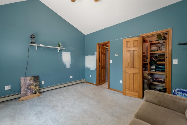 222 Main St, Alton, NH 03809 - unfurnished bedroom with carpet floors, a baseboard heating unit, and high vaulted ceiling