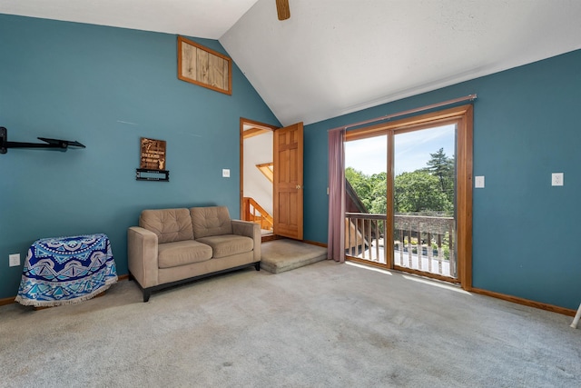222 Main St, Alton, NH 03809 - carpeted living area with vaulted ceiling and baseboards