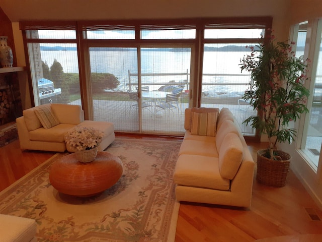 11 Portside Dr Unit 5, Moultonborough, NH 03254 - living room with wood finished floors and healthy amount of natural light