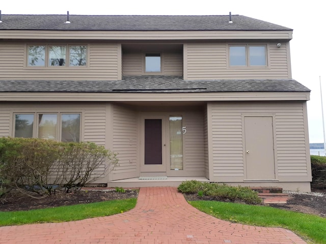 11 Portside Dr Unit 5, Moultonborough, NH 03254 - view of front facade featuring a shingled roof