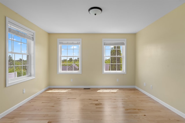 33 Thatcher Way, Barrington, NH 03825 - empty room with light wood-type flooring and baseboards