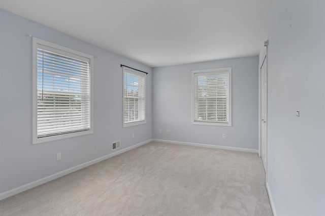 33 Thatcher Way, Barrington, NH 03825 - spare room with baseboards and light carpet