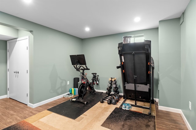 33 Thatcher Way, Barrington, NH 03825 - exercise room featuring wood finished floors, baseboards, and recessed lighting