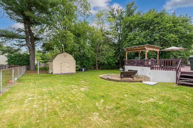 396 Huse Rd, Manchester, NH 03103 - view of yard with a deck, a pergola, and view of scattered trees