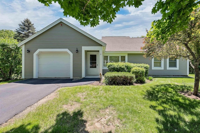 10 Vappi Vale Ln, Moultonborough, NH 03254 - single story home featuring asphalt driveway, a garage, and a front lawn