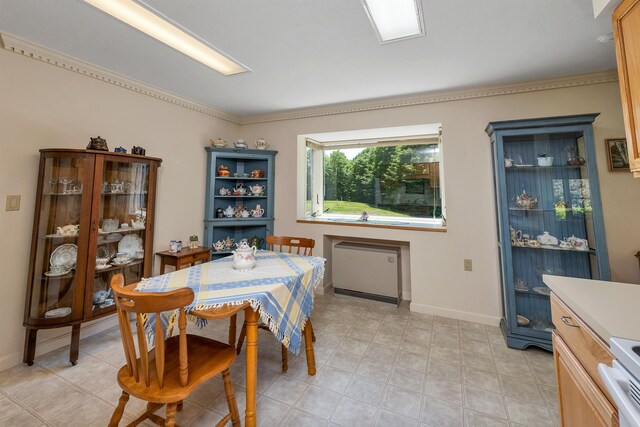 10 Vappi Vale Ln, Moultonborough, NH 03254 - dining area featuring radiator heating unit, ornamental molding, and baseboards