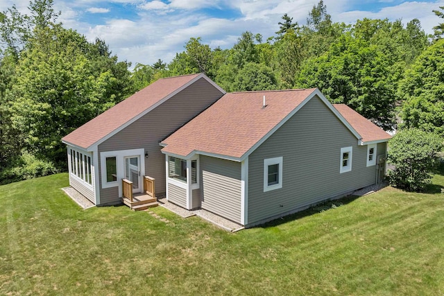 10 Vappi Vale Ln, Moultonborough, NH 03254 - rear view of house featuring a yard and a shingled roof