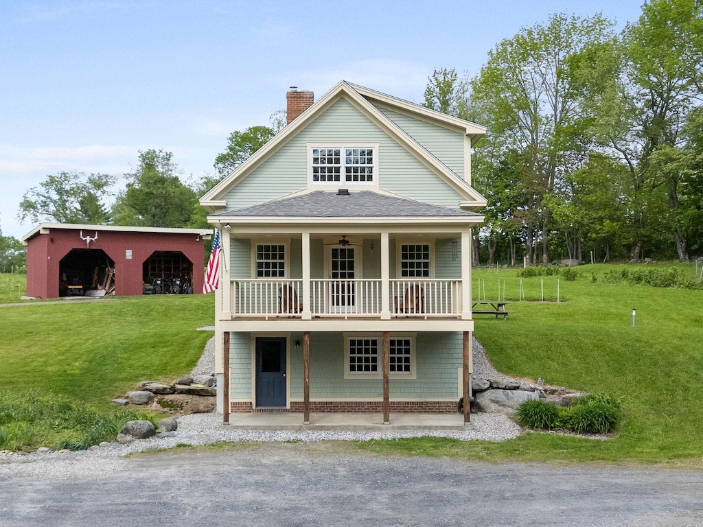 184 Culver Hill Rd, Middlesex, VT 05602 - back of house with a yard, a chimney, and roof with shingles