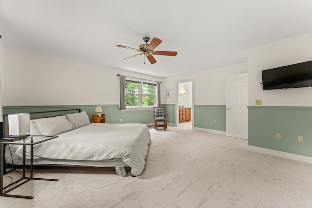 138 Connor Rd, Montpelier, VT 05602 - carpeted bedroom with baseboards, ensuite bathroom, and a ceiling fan