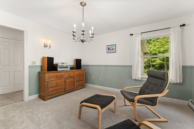 138 Connor Rd, Montpelier, VT 05602 - living area featuring a chandelier, light carpet, baseboards, and baseboard heating