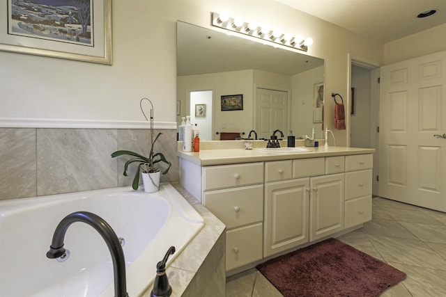 16 Carleton Way, Hales Location, NH 03860 - bathroom featuring vanity, a bath, and tile patterned floors