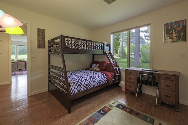 16 Carleton Way, Hales Location, NH 03860 - bedroom featuring wood finished floors, multiple windows, and baseboards