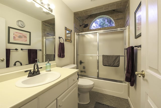 16 Carleton Way, Hales Location, NH 03860 - full bath with toilet, tile patterned floors, vanity, and combined bath / shower with glass door