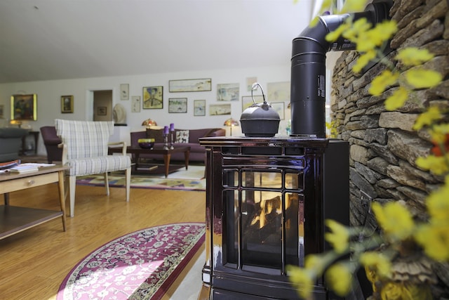 16 Carleton Way, Hales Location, NH 03860 - detailed view of wood finished floors and a wood stove
