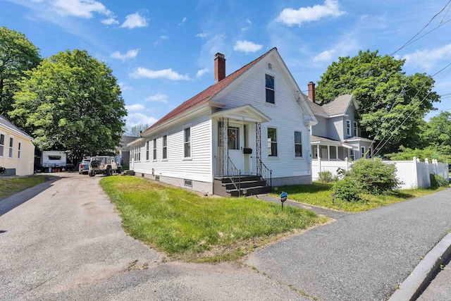 90 Sullivan St, Claremont, NH 03743 - view of front of property featuring a chimney