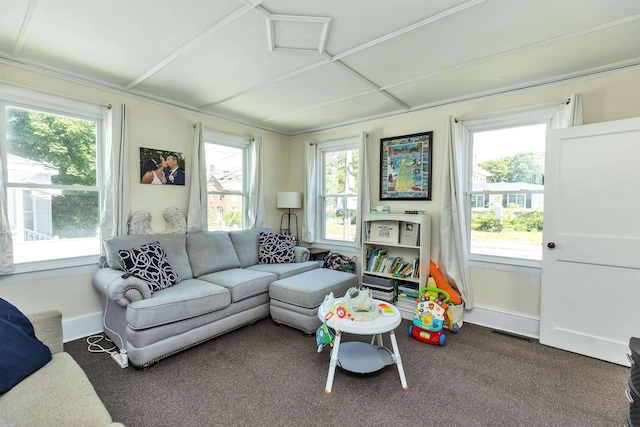 90 Sullivan St, Claremont, NH 03743 - carpeted living room with healthy amount of natural light and baseboards