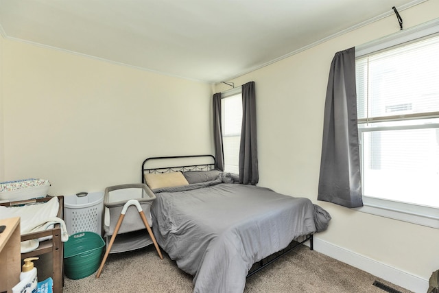 90 Sullivan St, Claremont, NH 03743 - bedroom featuring crown molding, carpet floors, and baseboards