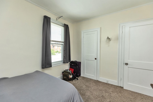 90 Sullivan St, Claremont, NH 03743 - bedroom with carpet, crown molding, and baseboards