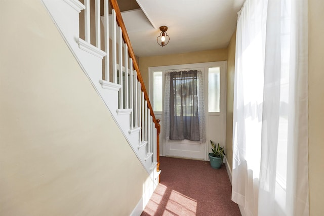 90 Sullivan St, Claremont, NH 03743 - entrance foyer featuring carpet and stairway